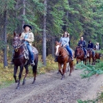 How can you prepare for a long ride on your horse with family and friends?